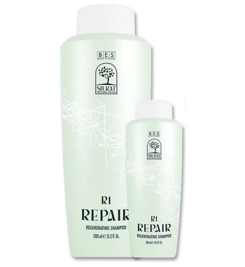 Two light green bottles of R1 Regenerating Shampoo, 1000 ml and 300 ml sizes with white caps and geometric label design, ideal for nourishing and repairing hair.
