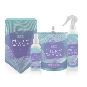 The Milky Wave Try Me Kit features four hair product containers—a spray bottle, pump bottle, pouch, and a branded box—each decorated with blue and purple wave designs.