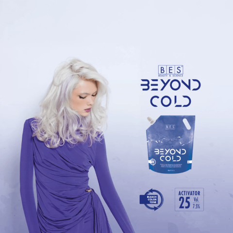 A woman with icy blonde hair and a purple dress stands beside the Beyond Cold Try Me Kit packaging and branding on a light background.